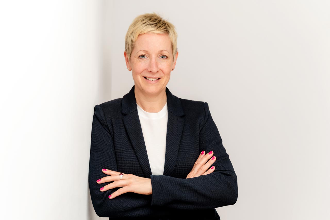 Jo Farr Coaching founder wearing black jacket with arms crossed